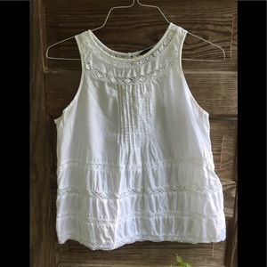 White eyelet sleeveless blouse